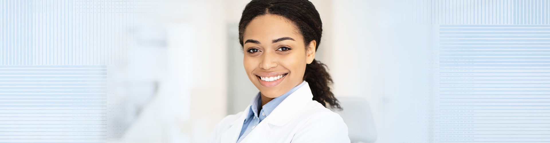 a female dentist smiling